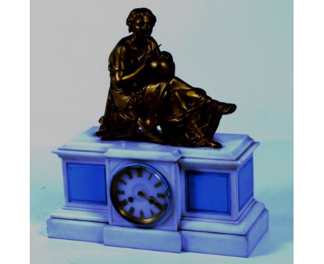 A heavy Victorian white marble Mantle Clock, of breakfront outline and with large gilt metal figure of Lady holding globe and