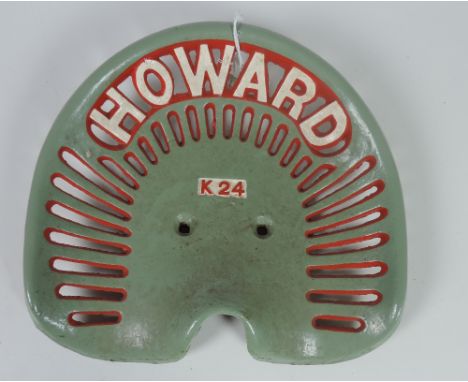 A "Howard" - K24 Tractor Seat, painted olive green, red and white, G.B. 314, Rate 5, FR 523, Rate 4. (1)