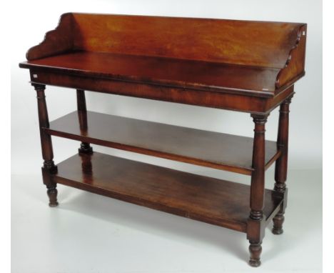 A fine quality early 19th Century Irish mahogany three tier Dumbwaiter, attributed to Williams and Gibton, the tall rail back