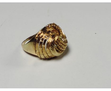 An unusual modern design 18ct gold Ring, (size "N"), approx. 7.3 gms. (1)