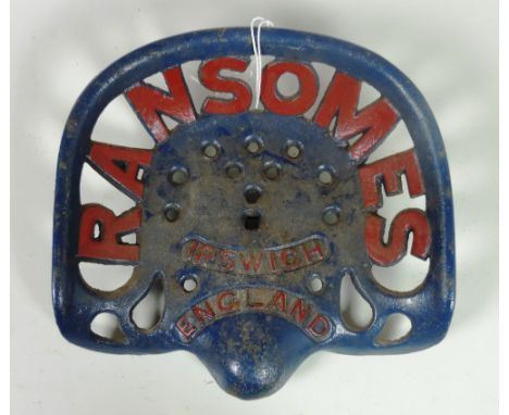 A "Ransomes, Ipswich, England" Tractor Seat, painted blue with red text, G.B. 53.2, CN 4237, Rate 5. (1)