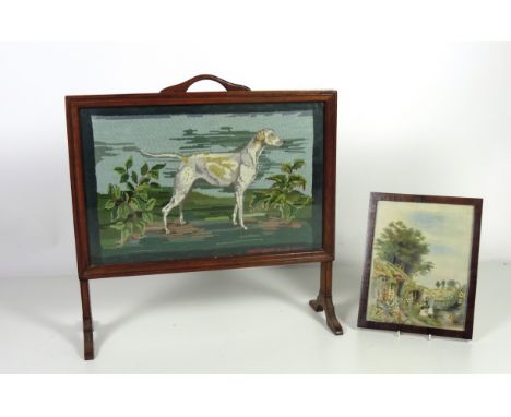 An oak framed Fire Screen with tapestry panel of "A Hound in a Landscape," 66cms x 70cms (26" x 27 1/2"); and a finely worked