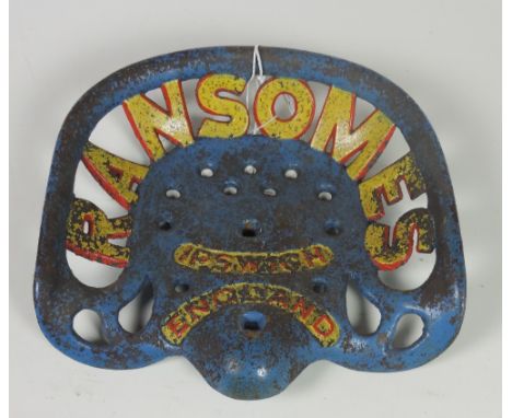 A "Ransommes, Ipswich, England," Tractor Seat, painted blue, yellow and red. FR 879, CN A 247, Rate 4. (1)