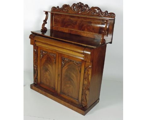 A William IV period figured mahogany Chiffonier, with shelf back, frieze drawer and two panel doors on plinth base. (1)