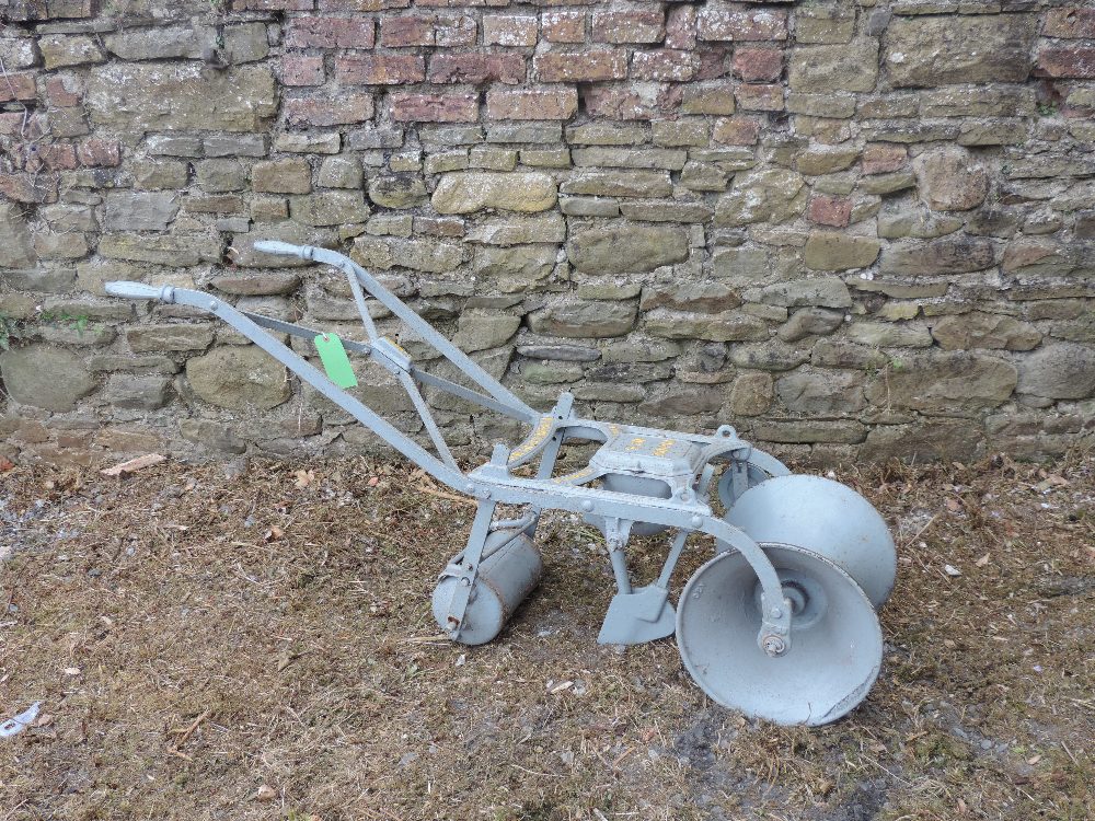 An antique metal Turnip Sower, "Pierce No. 4 Victor Sower, by Pierce