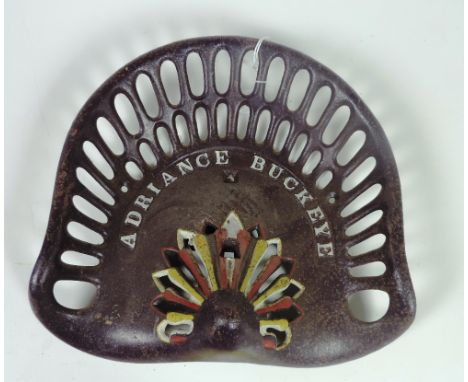 An "Adriance Buckeye - Type 1" Tractor Seat, painted plum, yellow and white text, Fr. 19, Rate 4. (1)