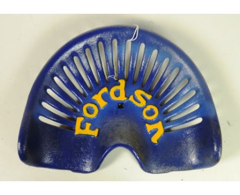 A "Fordson" Tractor Seat, painted blue and yellow, Extremely Rare. Fr. 1160, Rate 10. (1)