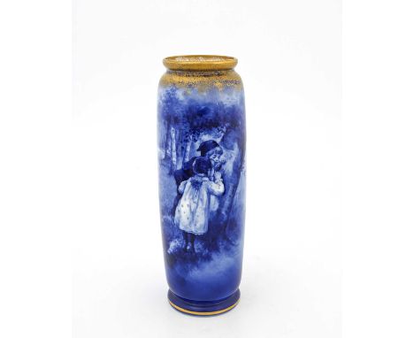 A Royal Doulton blue children vase, underglaze painted transfer decoration, footed cylindrical form, children peering into a 