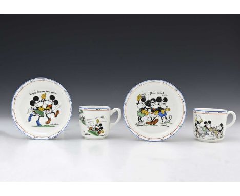 After Walt Disney for Paragon China,a selection of Disney tableware, comprising two cups and saucers featuring Mickey Mouse, 