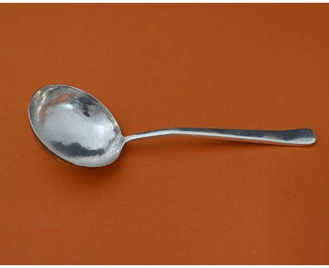 Harry Warmington for the Guild of Handicraft, an Arts and Crafts silver ladle spoon, London 1962, the hemispherical planished