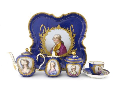 A Sevres style cabaret set, 19th century, including teapot, jug, covered sucriere, tray, cup and saucer, each painted with a 