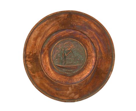 Walter Edwards, an Arts and Crafts copper plaque, circular borad rimmed alms dish form, the central image of Selly Manor embo