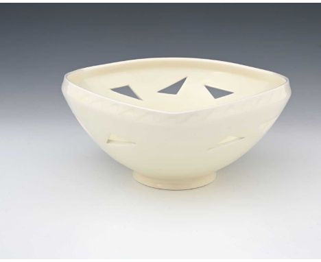 Ono Kotaro (Brazilian, 1953), a three-sided bowl with reticulated sides, white glaze, signed, 26cm wide, boxed with leaflet