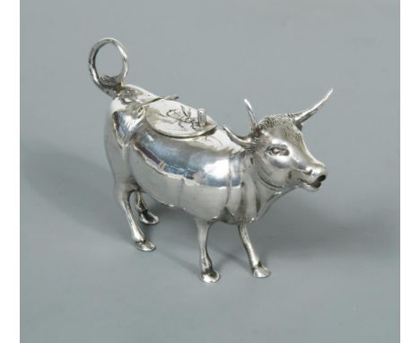 A German semi naturalistic cow creamer, marked to the tail 'IF & Son ltd' for Israel Freeman and Son, together with 'Sterling