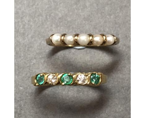 An emerald and diamond five stone ring together with a similar pearl ring, both of slim linear profile and set in hallmarked 