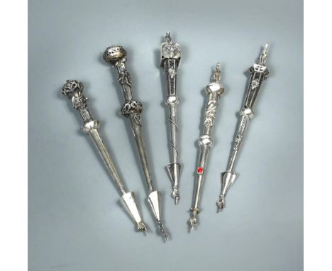 A collection of five yadayim, all of traditional design, the lower sections a hollow conical tube terminating in a pointing f