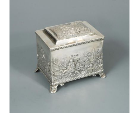 A Victorian silver tea caddy, by Thomas Hayes, Birmingham 1899, of rectangular form, heavily decorated with repoussé cherubs 