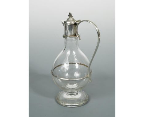 A Victorian silver mounted glass flagon, by Jesse Earls, London 1891, the bulb shaped body raised on a single pedestal foot, 