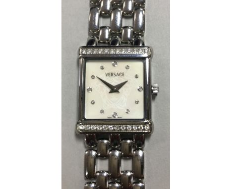 Versace - A lady's 'V' stainless steel wristwatch, the rectangular signed mother of pearl dial with silk screened Medusa head