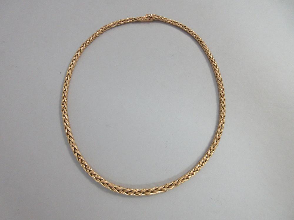 A graduated spiga link necklace with French assay marks for 18ct gold ...