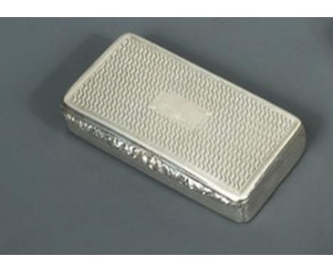 A George IV silver snuffbox, probably by John Tongue, Birmingham 1824, of rectangular form, the body engine turned all over, 