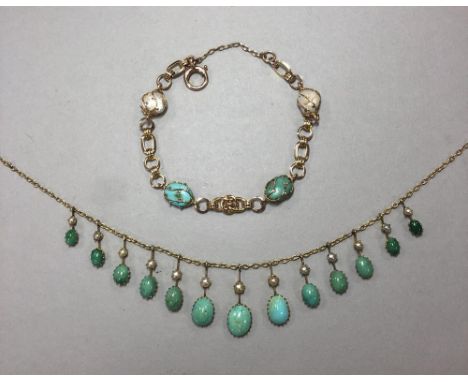 A turquoise and seed pearl fringe necklace and a turquoise and pearl bracelet, the necklace composed of a trace link chain se