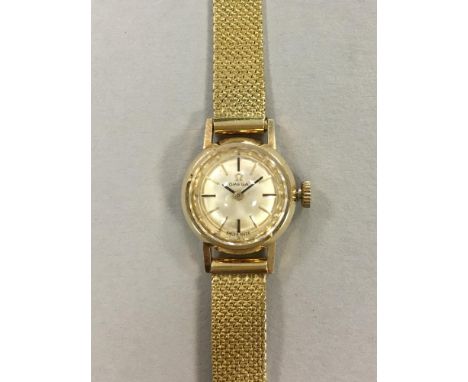 Omega - a lady's 14ct gold wristwatch, circa 1966, the circular signed dial with baton markers, blued hands and diamond facet