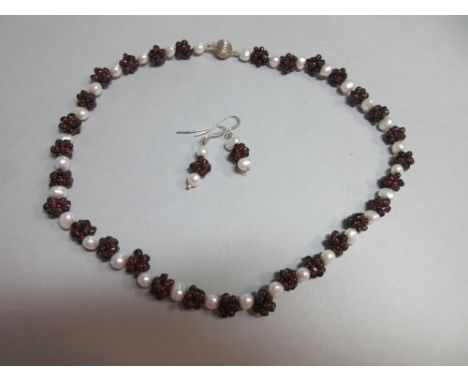 A garnet bead 'raspberry' and cultured pearl suite, the necklace composed of clusters of small garnet beads resembling raspbe