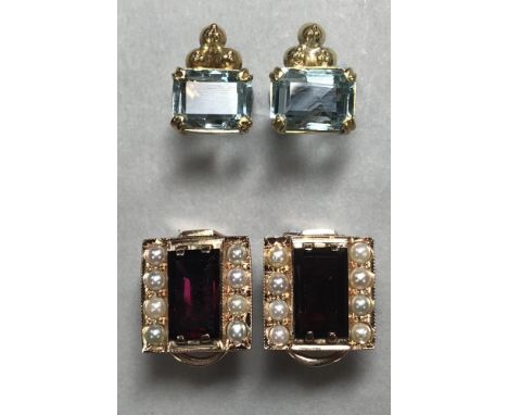 A pair of garnet and pearl earstuds and a pair of aquamarine earstuds, the first of boxed outline each with a rectangular cut