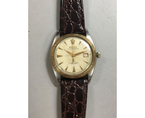 Rolex - A gentleman's Oyster perpetual wristwatch, circa 1952, the signed circular cream coloured dial with gold coloured tri