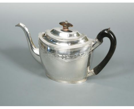 A George III silver teapot by Peter, Ann and William Bateman, London 1801, of oval from, the upper body decorated with a band