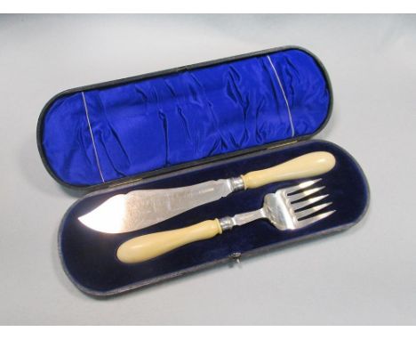 A pair of George V silver fish servers, by Harrison Bros & Howson, Sheffield 1910/11, the five pronged fork with parallel lin