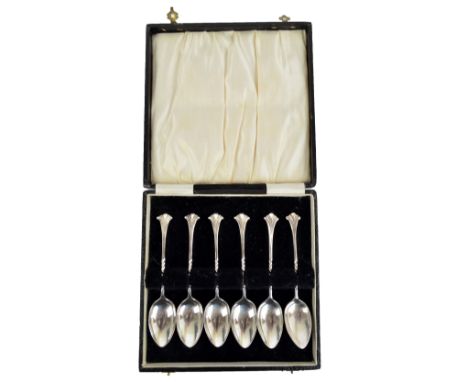 JAMES DIXON & SONS; a cased set of six Edward VII hallmarked silver coffee spoons with twist decorated stems, Sheffield 1901,