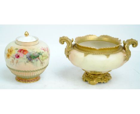 A large Royal Worcester blush ivory porcelain bowl with gilt raised rim, with foliate scroll handles and foot, marked in gree