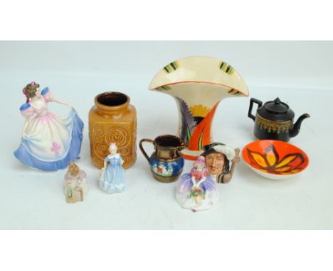A small group of ceramics including a Poole Pottery circular floral decorated bowl, a copper lustre glazed jug, a Royal Doult