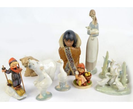 Six Lladro figures comprising a girl holding a lamb, two bears, two geese, a salt glazed kneeling Inuit, also two Lladro gees