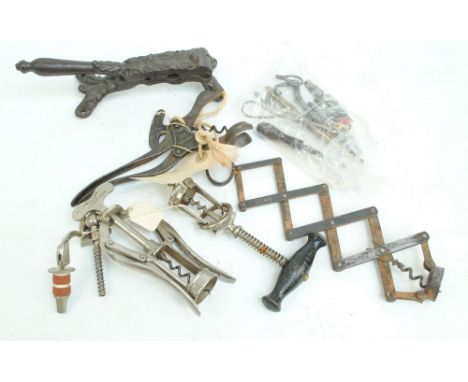 A group of various corkscrews to include J Heeley & Sons 'A1 double lever' and 'Weir's Patent 12804' examples, also a Victori