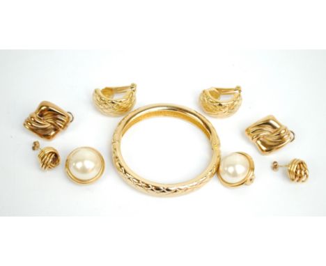 A pair of 9ct yellow gold ear studs of knot design (one af) and a further lozenge shaped hollow pair, also two pairs of costu