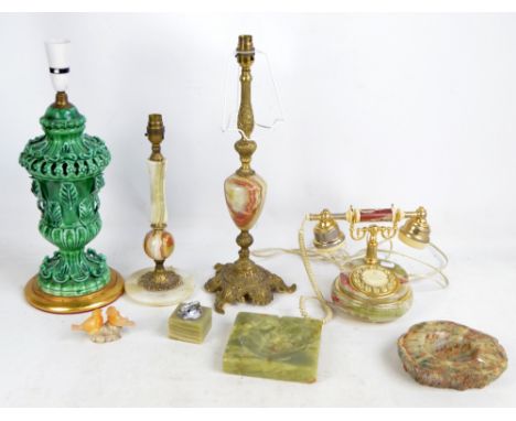 A group of various onyx desk items, including telephone, two lamps and a lighter, also an ornamental ceramic green glazed tab