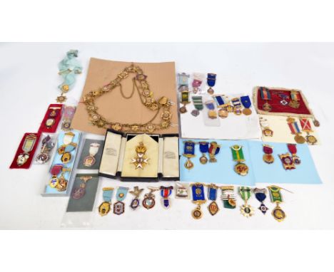 A collection of predominantly Masonic and Order of Buffalo jewels and ribbons, including five hallmarked silver and enamel ex