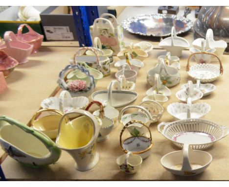 A collection of 19th and 20th century ceramic baskets including examples by Royal Winton, Wedgwood, Aynsley, Fenton, a Royal 