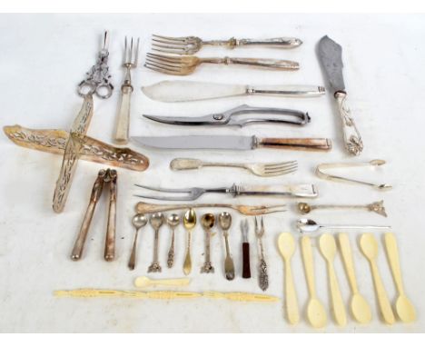 A group of electroplated flatware to include fish servers and German silver handled carving tools, a hallmarked silver desser
