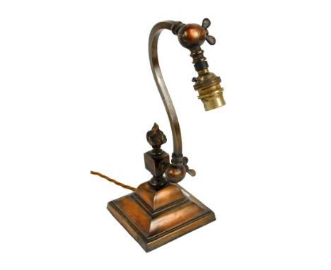 A circa 1900 oxidised copper lamp with adjustable square sectioned scrolling arm and inscribed to the wing nut 'AGS, 113C', h
