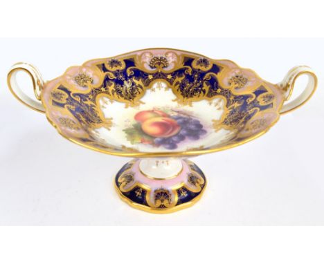 A Royal Worcester porcelain twin handled fruit bowl, painted with grapes and peaches to the centre within cobalt blue and pin