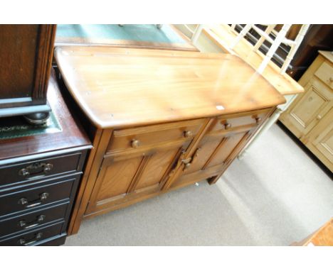 An Ercol sideboard.