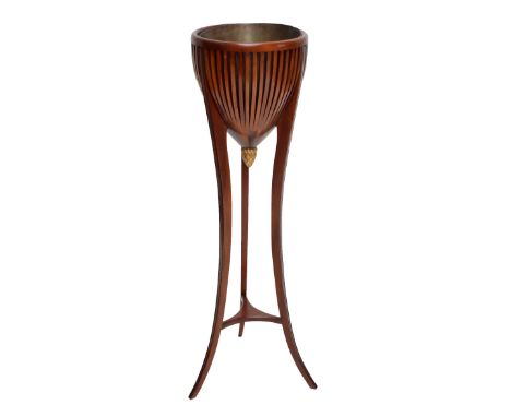 A reproduction jardinière stand.
