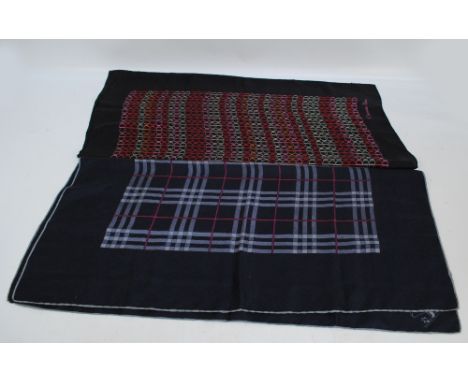 CHRISTIAN DIOR; a black silk scarf decorated with a formation of numerous variously coloured monograms, 79 x 75cm, and a Burb