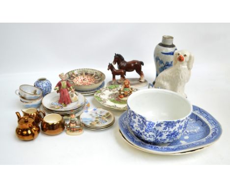 A quantity of mixed ceramics to include a Staffordshire spaniel, two Goebel figures, lusterware cream jug, sugar bowl, and mi