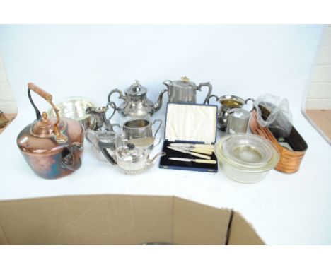 A quantity of silver plated items to include a three piece tea service, a boxed set of six ivorine handled knives, a twin han