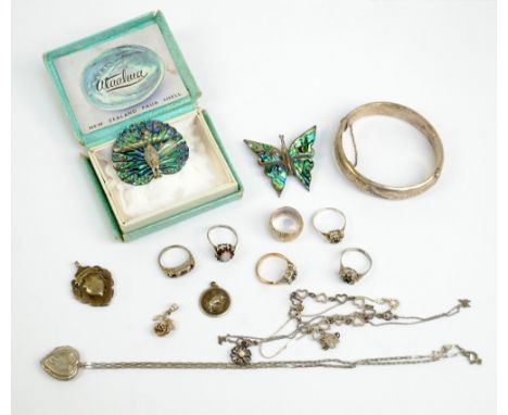 A small collection of jewellery including silver pendants, chain necklaces, a heart link bracelet, a serpentine bracelet, sil